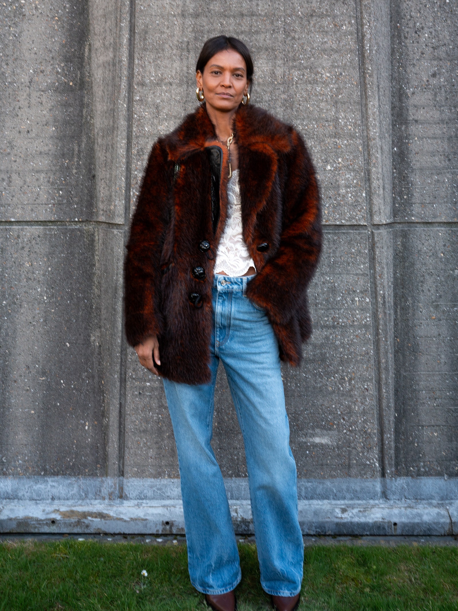 Images may contain Liya Kebede Clothing Pants Jacket Jeans Jacket Adult Shoes Accessories and Jewelry