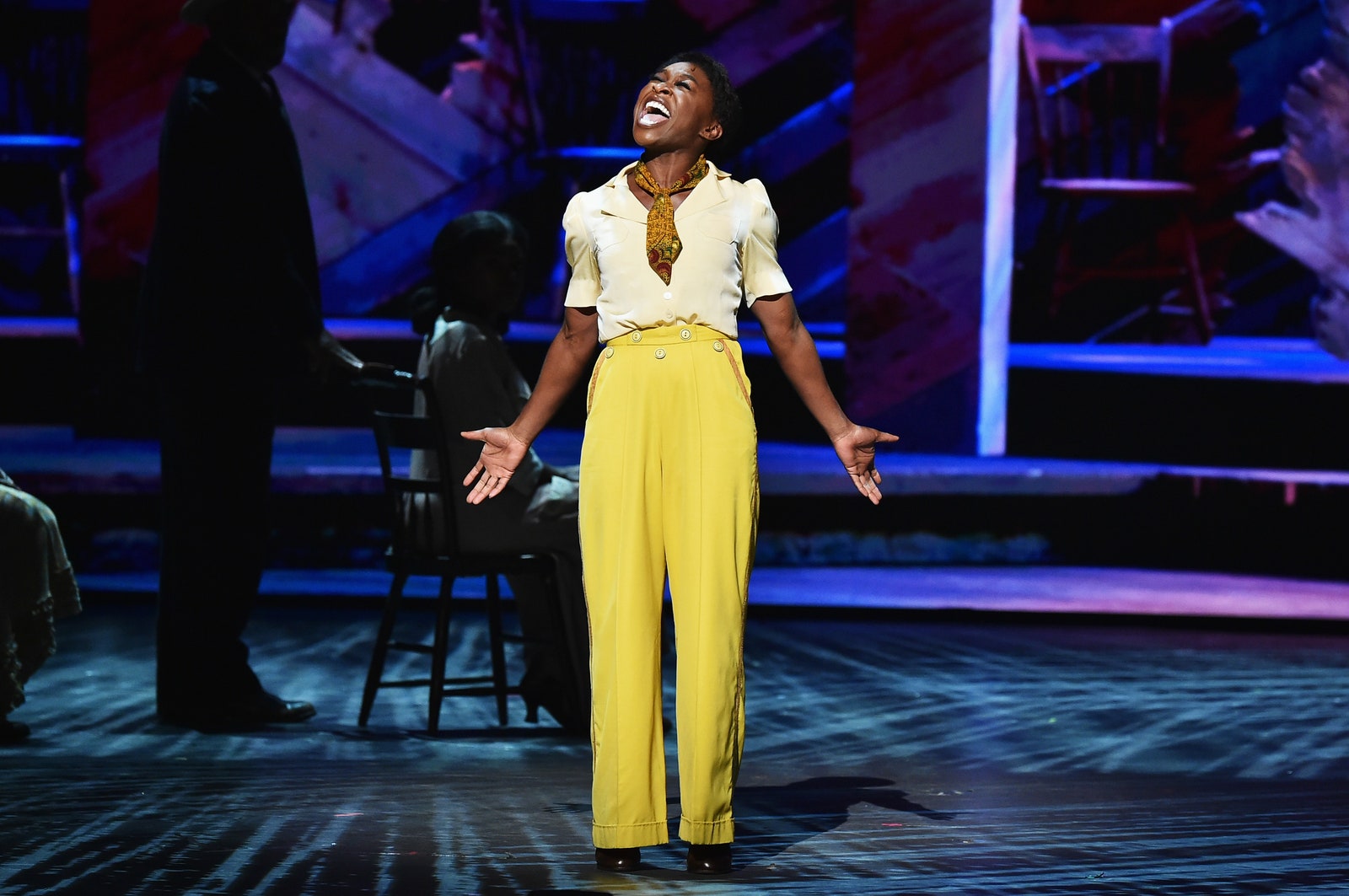 Images may contain Cynthia Erivo performer solo adult shoe chairs and furniture